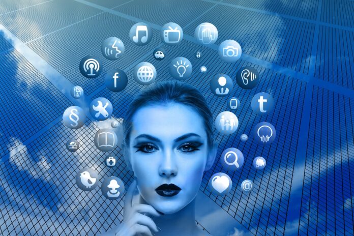Social Entrepreneurship als Motor für gesellschaftlichen Wandel women gesic cht mit buttons um den kopf Bild von Gerd Altmann auf Pixabay