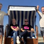 Wie ein digitales Schloss den Strandkorb revolutioniert strandbutler strandkorb team bild am strand im strandkorb