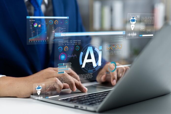 Eine junge Angestellte arbeitet fokussiert am Laptop in einem hellen Büro an einer KI-Weiterbildung der Google Summer Academy 2026.