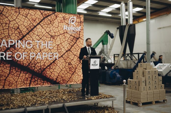 Releaf Paper Founder Alexander Sobolenko on stage with a presentation about Releaf Paper how it works!