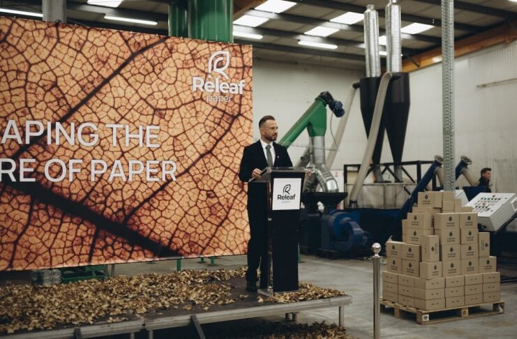 Releaf Paper Founder Alexander Sobolenko on stage with a presentation about Releaf Paper how it works!