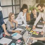 Business Plan Guide: How Founders Boost Startup Success Business Plan Guide: How Founders Boost Startup SuccessYoung business people meeting at office and discussing together a new startup project.