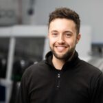 Anaphite: Dry Coating Revolution for EV Battery Production dry-coating-anaphite-ev-battery-Alex-Hewitt-COO-Co-Founder-of-Anaphite in the office