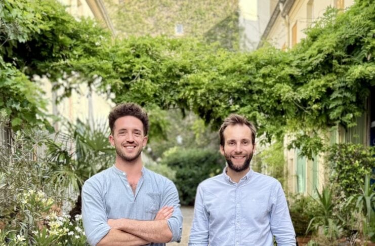 ev-dejablue-energy-platform The Founder Team of DejaBlue in a garden with plants in the backround
