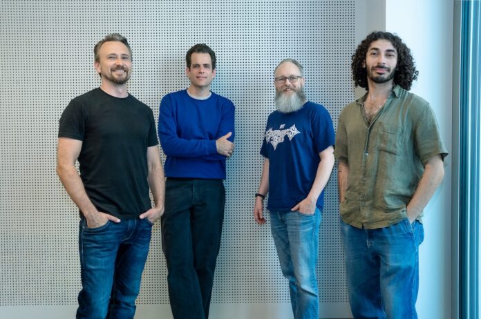 Kazimi Team in front of a wall. Kazimi Raises €2.2M Pre-Seed Round in Berlin